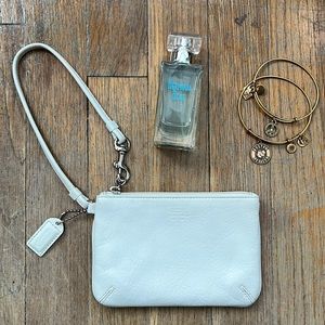 Coach • white leather wristlet